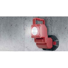 Portable spotlight with emergency light feature